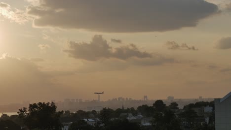 Plane-Flying-at-Sunset