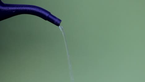 Pouring-Water-from-Watering-Can-