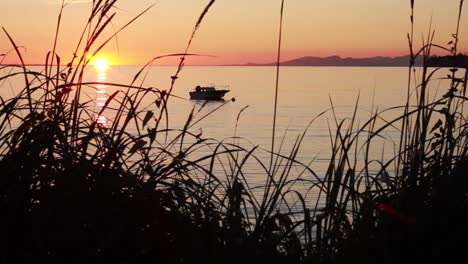 Anchored-Boat-at-Sunset