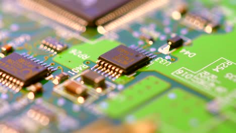 Macro-Shot-Of-Microchips-On-a-PCB