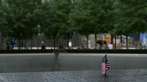 Focus-Pull-on-USA-Flag-in-Plaque-at-911-Memorial