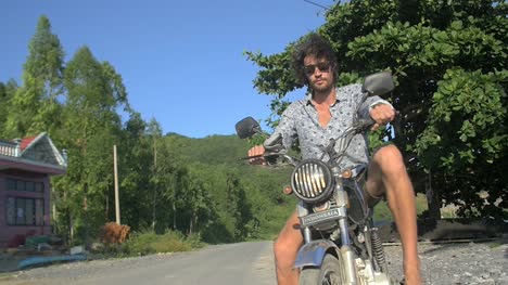Man-Riding-Off-on-Motorbike
