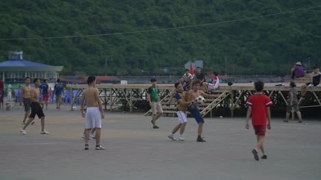 Men-Playing-Soccer-in-Street-1