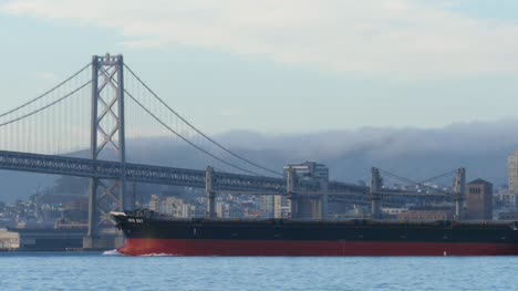 Cargo-Ship-Passing-Under-San-Francisco-Bridge