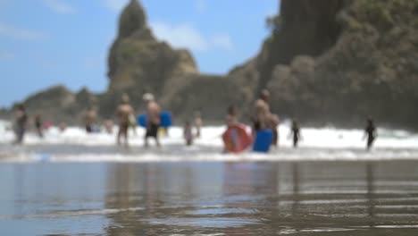 Out-of-Focus-Tourists-on-Beach