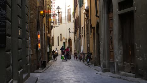 Tourists-Riding-Segways-Down-a-Small-Street