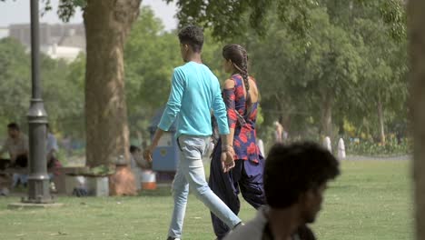 Couple-walking-through-a-Park