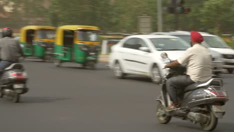 Indian-Men-Riding-Mopeds