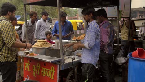 Handheld-Shot-of-Indian-Street-Food-Vendor