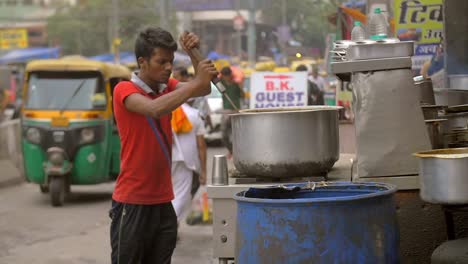 Street-Food-Vendor-Stirs-Large-Pot