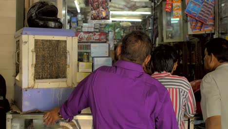 Panning-Shot-Across-Indian-Newsagent-Shopfront