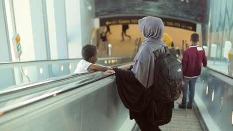 Mother-and-Son-Travelling-Through-an-Airport