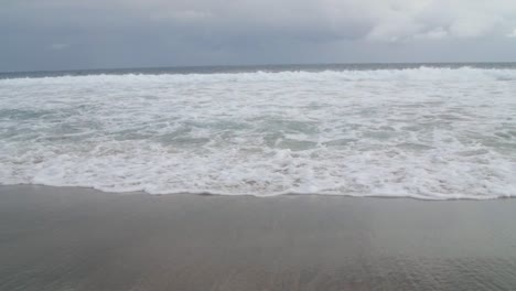 Foamy-Waves-Crashing-on-Beach