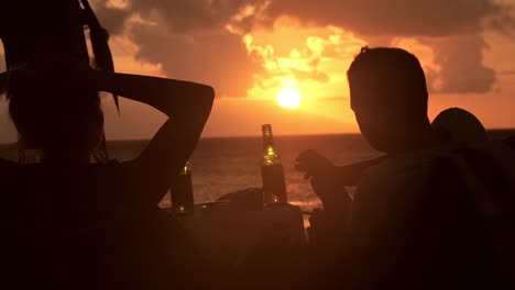Drinking-Beer-on-the-Beach-at-Sunset