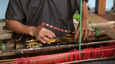 Woman-Weaving-on-a-Back-Strap-Loom