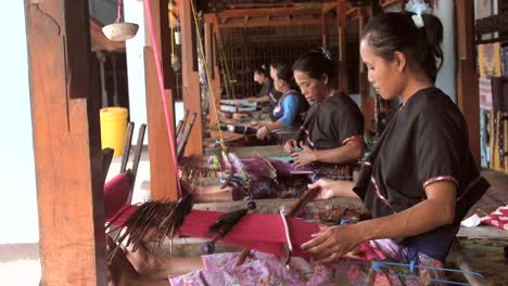 Woman-Weaving-in-a-Workshop