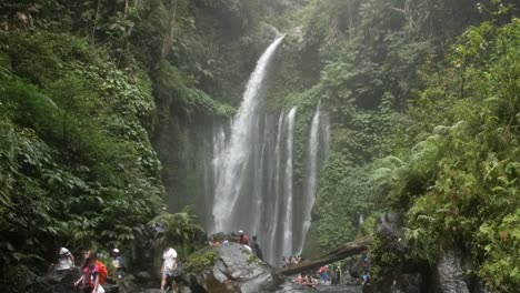 Sightseers-at-a-Waterfall-in-Indonesia