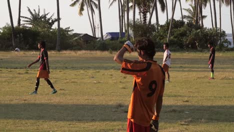 Indonesian-Men-Playing-Football