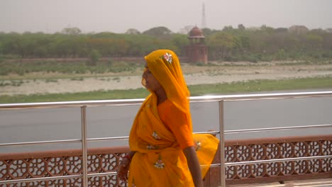 Slow-Motion-Shot-of-a-Woman-in-an-Orange-Sari