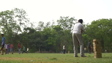 Man-Batting-in-a-Cricket-Game-in-India