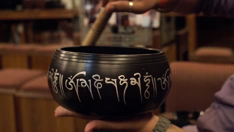 Close-Up-Shot-of-a-Singing-Bowl-in-Use