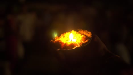 Puja-Candle-and-Flowers-at-Ceremony-in-Varanasi