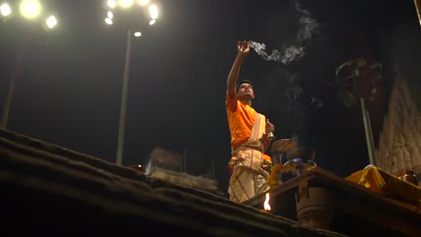 Man-Waves-Incense-at-Ganga-Aarti-Ceremony