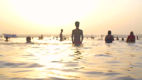 Man-Wades-into-the-Ganges-at-Sunset