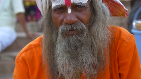 Panning-Shot-from-Sadhus-Hands-to-Face