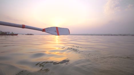 Oar-Entering-the-Water-at-Sunset