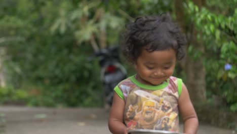 Handheld-Shot-of-Young-Balinese-Child