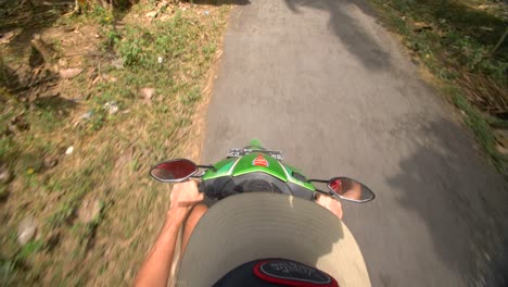 POV-Riding-a-Moped-Through-the-Jungle