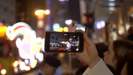 Filming-Parade-on-Smartphone