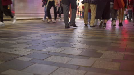 Legs-of-Pedestrians-on-Sidewalk