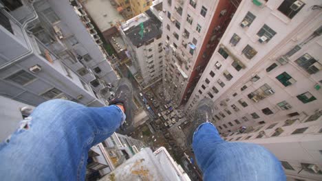 Sitting-on-Top-of-a-High-Rise-in-Hong-Kong