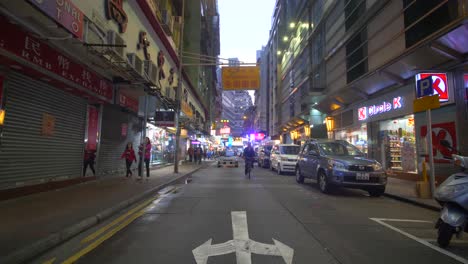 Car-and-Cyclist-in-Hong-Kong