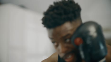 CU-of-Boxers-face-Whilst-Punching-Bag