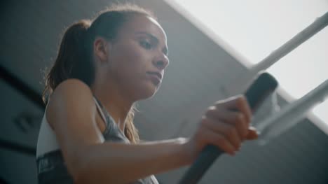 Woman-Using-Running-Machine-in-Gym