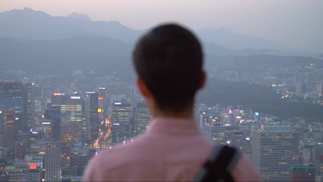Man-Overlooking-Seoul