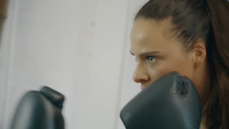 Female-Boxer-Punching-Bag-in-Slow-Motion