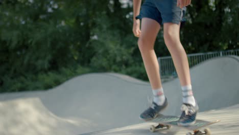 Skateboarder-Jumping-Out-of-Bowl-at-Skatepark