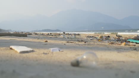 Light-Bulb-on-Rubbish-Filled-Beach