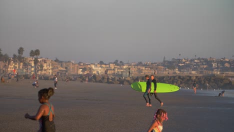 Surfers-Leaving-The-Sea-on-Venice-Beach