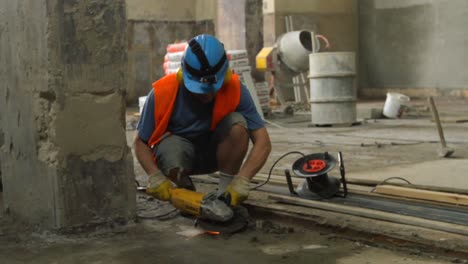 Construction-Worker-Using-Angle-Grinder