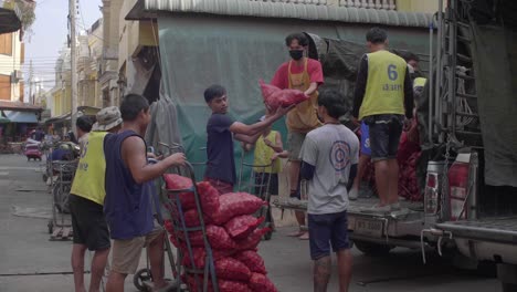 Men-Unloading-Vegetables-from-Truck