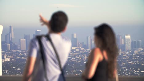 Man-Gesturing-at-LA-Skyline