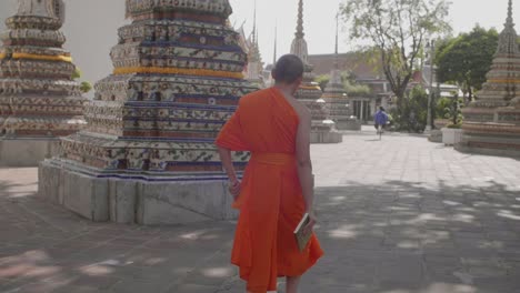 Monk-Walking-Through-Buddhist-Temple