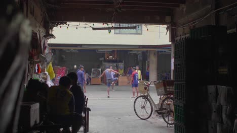 Men-Playing-With-Football-in-Bangkok