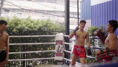 Three-Muay-Thai-Boxers-Sparring