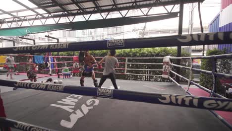 Muay-Thai-Fighters-Sparring-In-Ring
